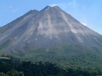The imponent Arenal Volcano from the lava flows